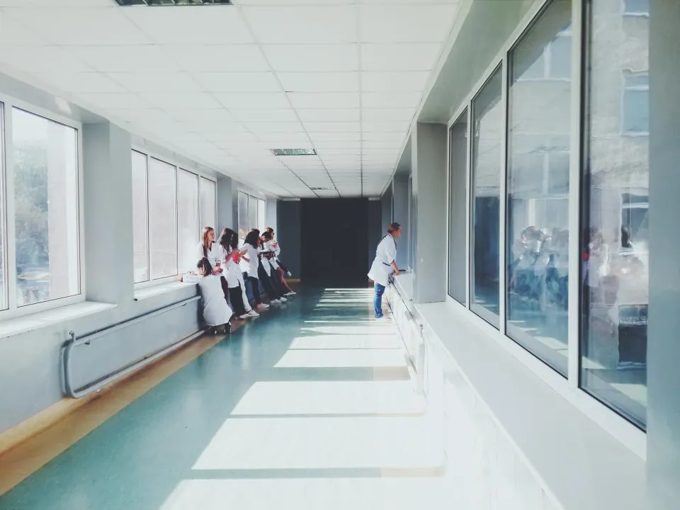 Hospital corridor with medical staff