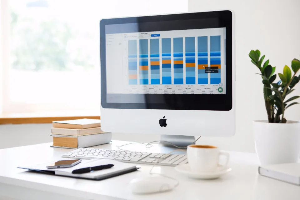 Desktop computer showing an operations dashboard on an office desk